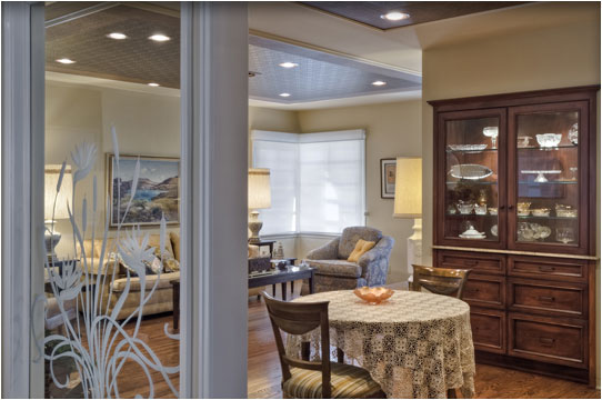 Here is a view from the family room, showing the dining room and living room.